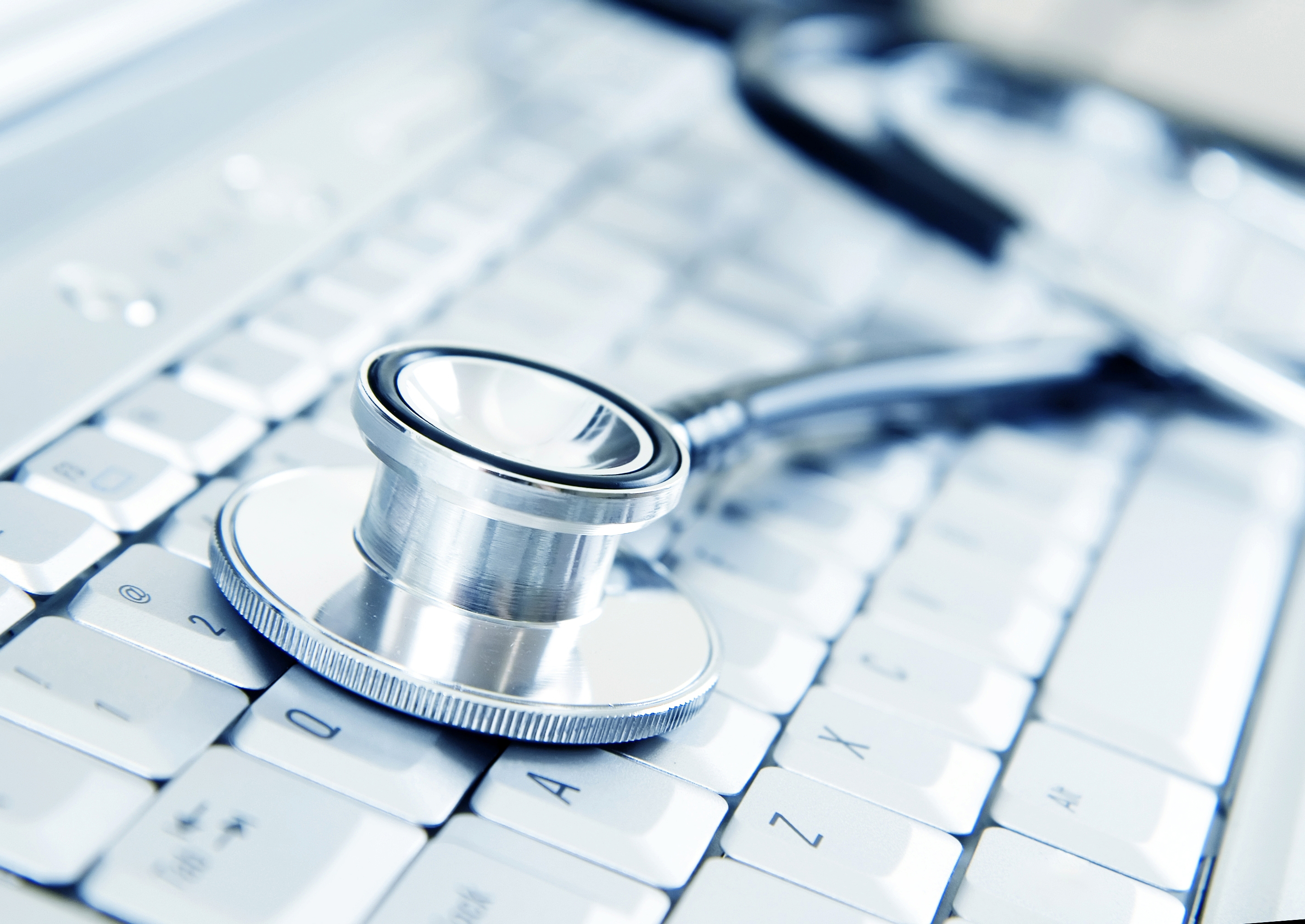 Modern Medicine, Silver Stethoscope on Silver Kyboard
