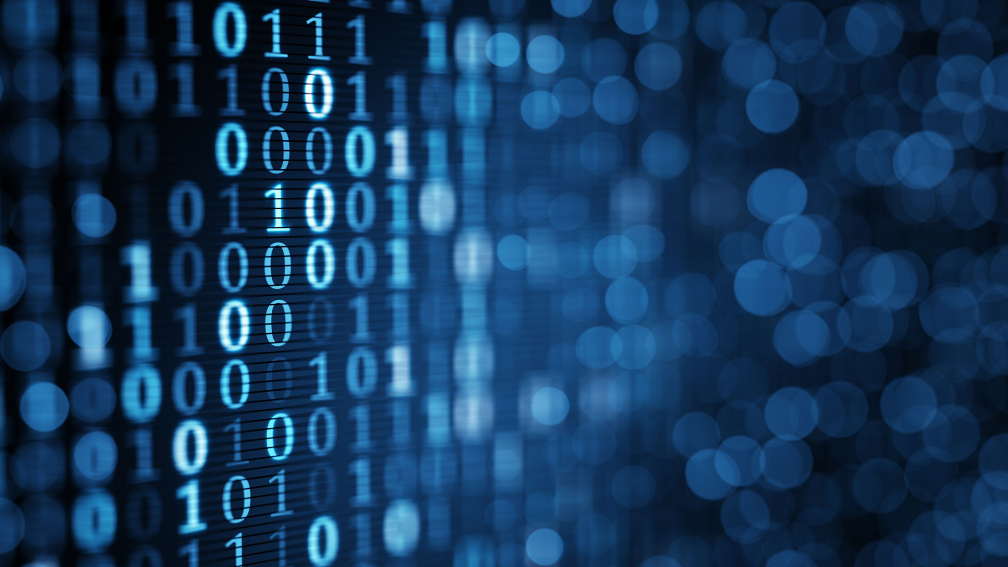 Blaue digitale Binärcodes auf Computer-Bildschirm